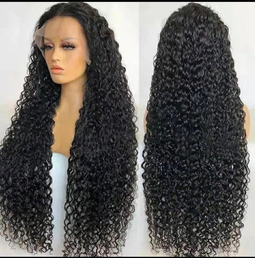 Black curly wig on a mannequin head with a close-up of the hair texture on a white background.