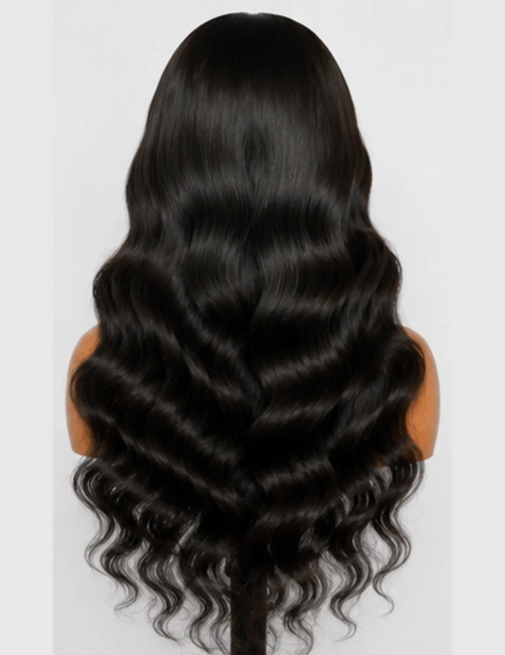 Back view of an HD Lace Frontal 13×4 Body Wave Human Hair Wig displaying full density and long body wave curls.