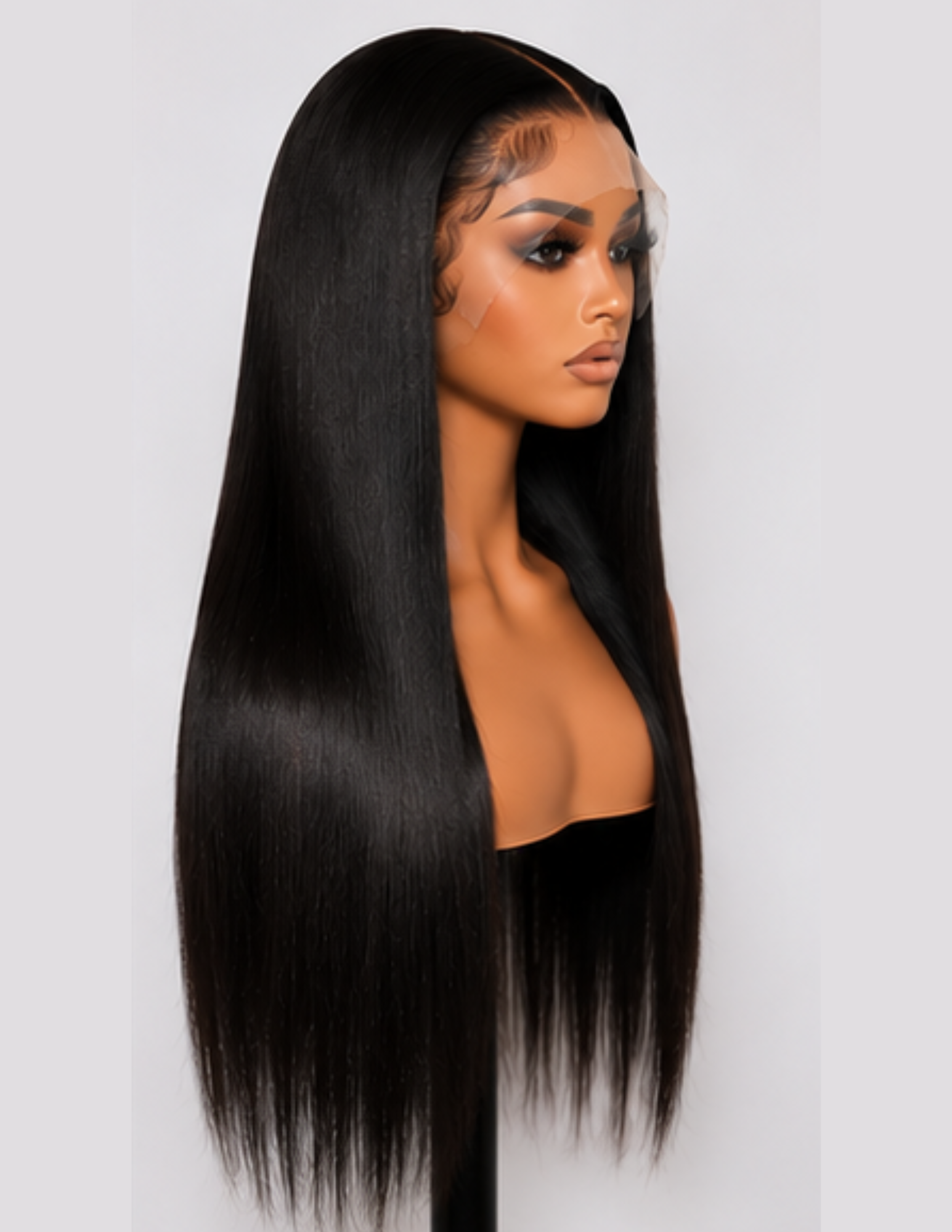 Left side view of a straight HD lace glueless wig made with raw human hair showing a sleek silky finish.
