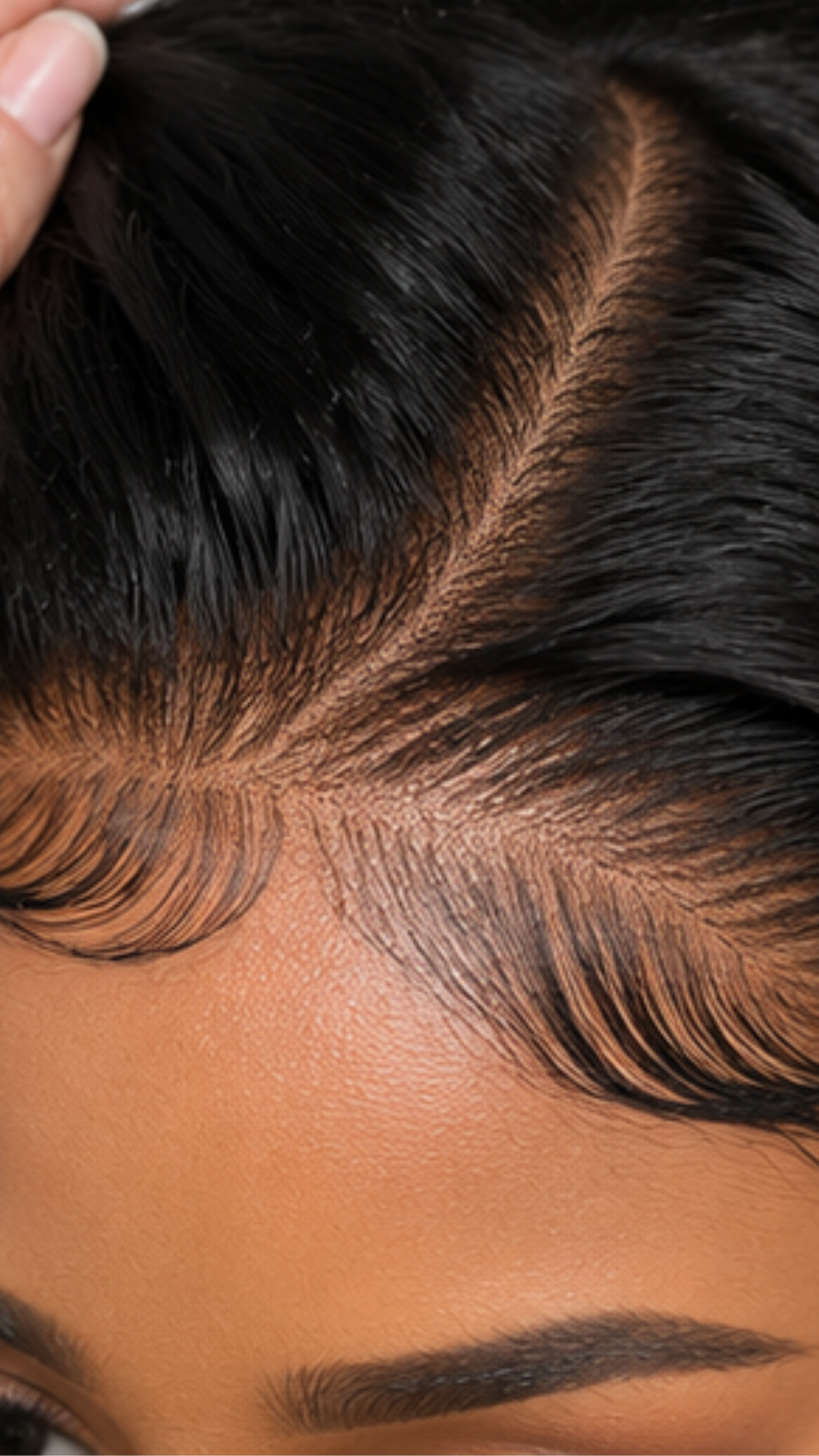 Close-up of the HD lace on a Water Wave Glueless Wig showing a realistic scalp and natural hairline.